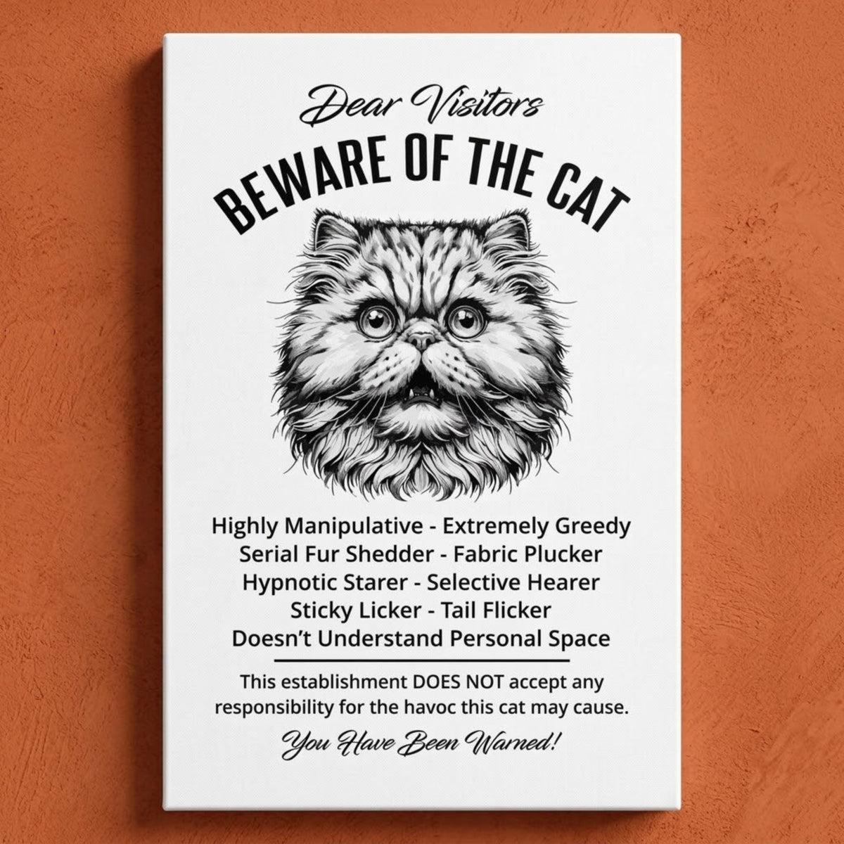 A rectangular white canvas sign with black printed funny text warning visitors about a Persian cat, featuring a black-and-white illustration and humorous behavioral descriptions. The canvas print is photographed against a orange wall.
