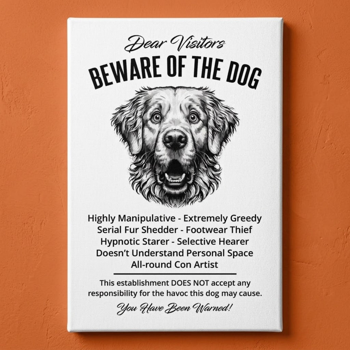A rectangular white canvas sign with black printed funny text warning visitors about a Golden Retriever dog, featuring a black-and-white face illustration and humorous behavioral descriptions. The canvas print is photographed against a orange wall.