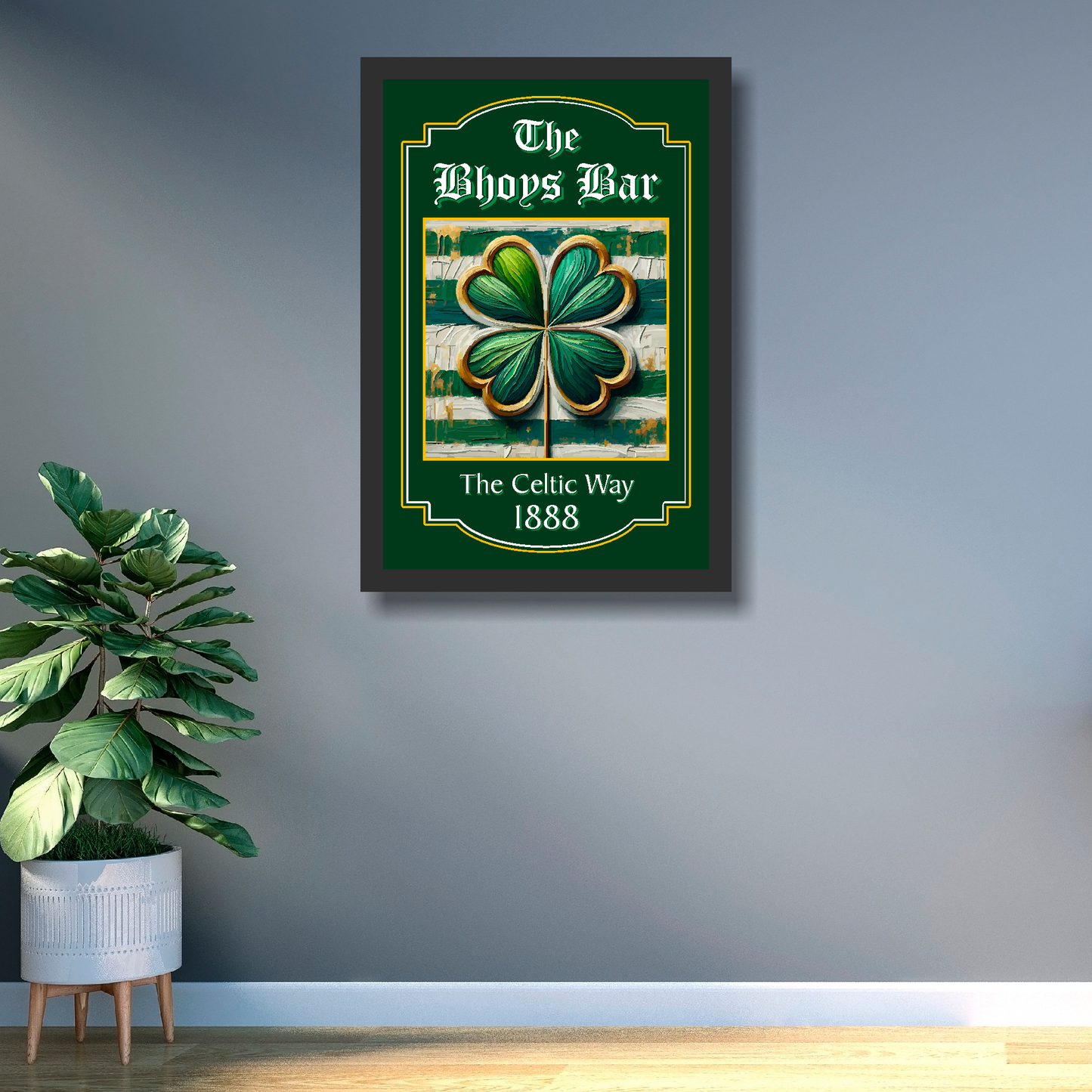 Celtic FC inspired framed artwork with a four-leaf clover design and text on a wall next to a plant