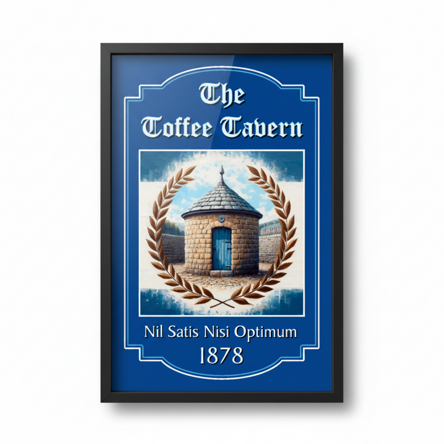 Framed artwork of 'The Toffee Tavern' with St. Ruperts Tower illustration and decorative elements on a blue background.
