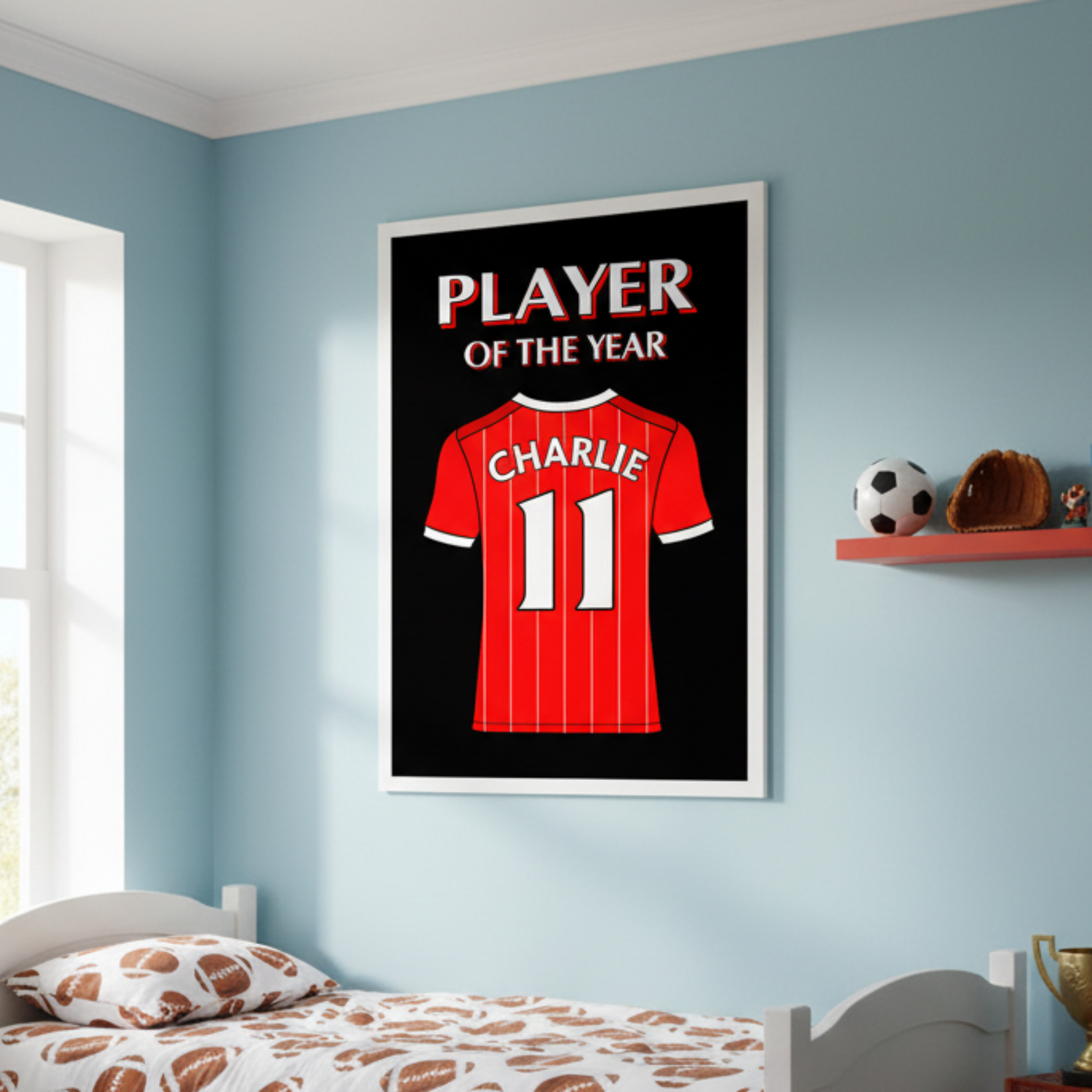 A framed art print featuring a red Liverpool football shirt with 'CHARLIE 11' on the back, above the words 'PLAYER OF THE YEAR' in white and red text on a black background.