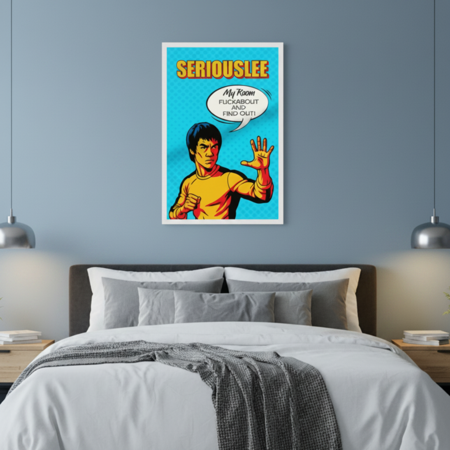 Pop art comic-style framed art print of a stylised Bruce Lee character on a blue wall above a bed.